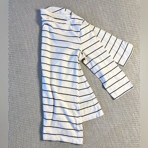 White 3/4 length knit top with horizontal black stripes
